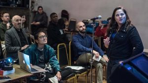 Lynne Doncaster speaking to Somerville News Garden event. Photo by Derek Kouyoumjian