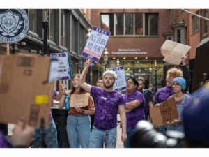 Emerson Union for Resident Assistants protest outside Emerson College President Jay Bernhardt's office on November 17, 2023. Photo by Frank Chen. Copyright 2023 Frank Chen.