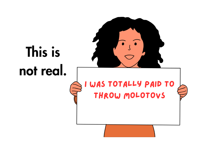 Protestor holding sign saying "I was totally paid to throw Molotovs" next to the words "This is not real."